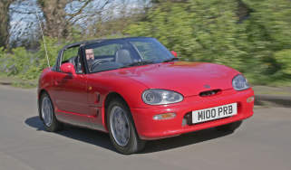 Used Suzuki Cappuccino - front tracking 
